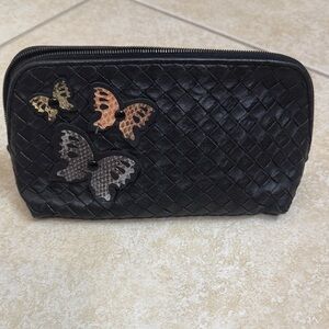 BOTTEGA VENETA Elegant Black pouch with Butterfly Accents